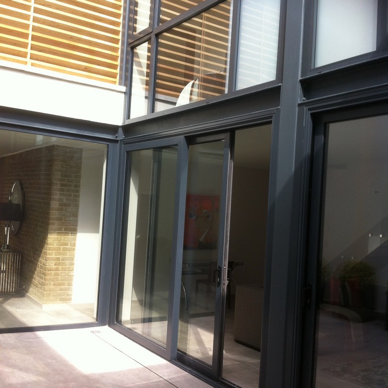 Anthracite aluminium sliding patio doors fitted in Swiss Cottage