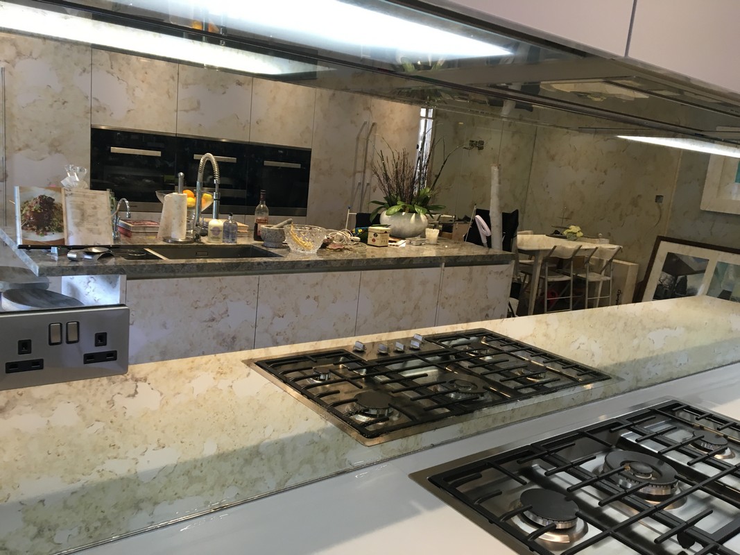 Mirror glass splashback in Swiss Cottage luxury kitchen